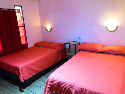 Katil atau katil-katil dalam bilik di INGRID LOFTS