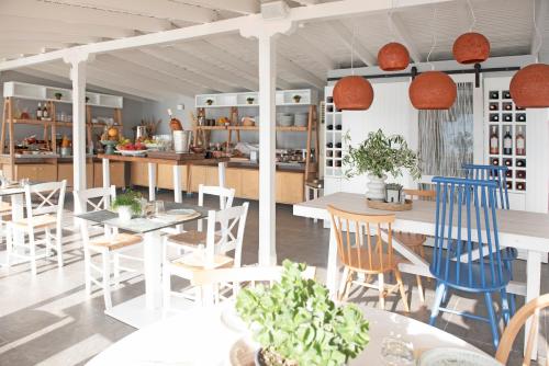 Reštaurácia alebo iné gastronomické zariadenie v ubytovaní White Suites Resort
