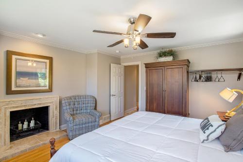 a bedroom with a bed and a fireplace at Surf's Up in New Buffalo