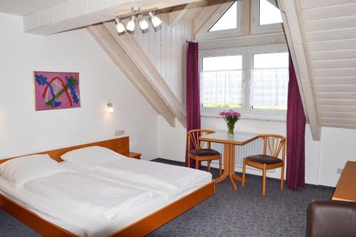 Postel nebo postele na pokoji v ubytování Hotel Relax
