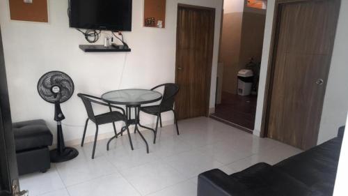 Posezení v ubytování SANTYS HOUSE MELGAR apartamentos amoblados con capacidad para 6 personas para 6 personas