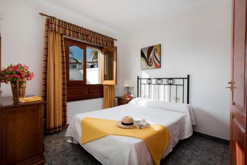 Säng eller sängar i ett rum på Villa Ramos Uno