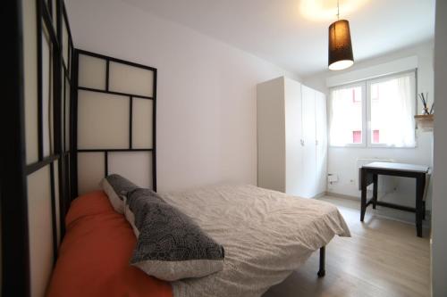 A bed or beds in a room at patio soleado DOS BAÑOS