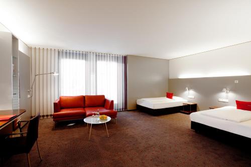 Vienna House Easy by Wyndham Stuttgartにあるベッド