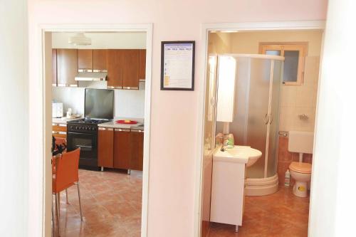 Kuchyň nebo kuchyňský kout v ubytování Apartments Dubravka