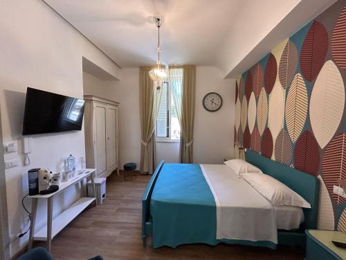 a bedroom with a bed and a wall with surfboards at La Casa di Matilde in Barcellona-Pozzo di Gotto