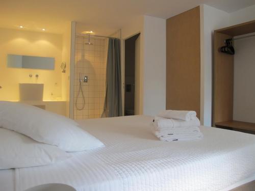 Katil atau katil-katil dalam bilik di B&B Bloc G