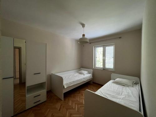 Ένα ή περισσότερα κρεβάτια σε δωμάτιο στο The Fig: Premium Apartment