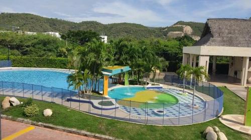 an image of a swimming pool at a resort at CASA EN GIRARDOT in Girardot