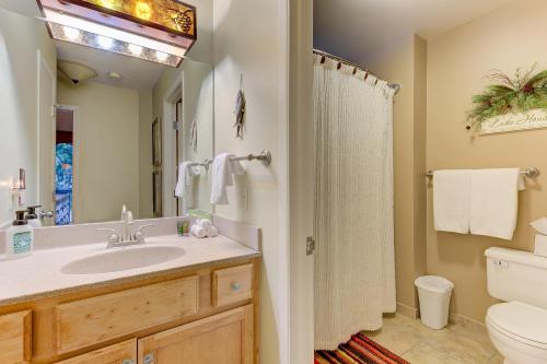 a bathroom with a sink and a toilet at Cozy Country Lakeside Condo 5705 in Traverse City