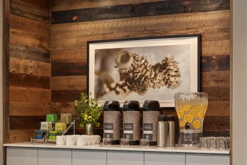 a shelf with a picture and a glass of orange juice at Residence Inn by Marriott Breckenridge in Breckenridge