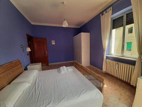 Posteľ alebo postele v izbe v ubytovaní Casa vacanze Omero 2