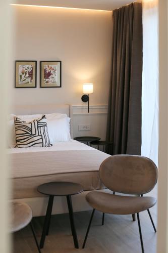 Ένα ή περισσότερα κρεβάτια σε δωμάτιο στο Salento Winery Lodge