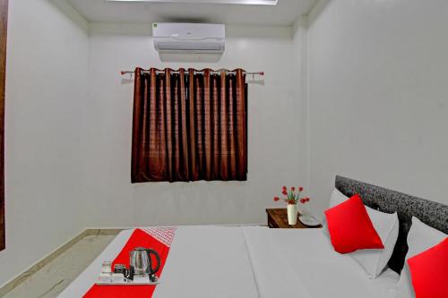 Katil atau katil-katil dalam bilik di Hotel O Dhurva Inn