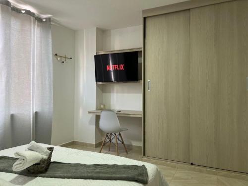 Μια τηλεόραση ή/και κέντρο ψυχαγωγίας στο Moderno Edifico en el sur de Cali