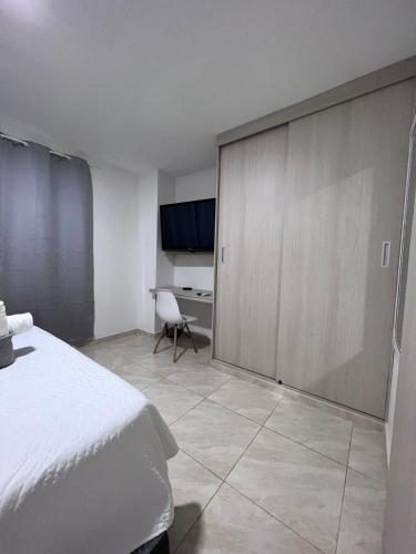 Μια τηλεόραση ή/και κέντρο ψυχαγωγίας στο Moderno Edifico en el sur de Cali