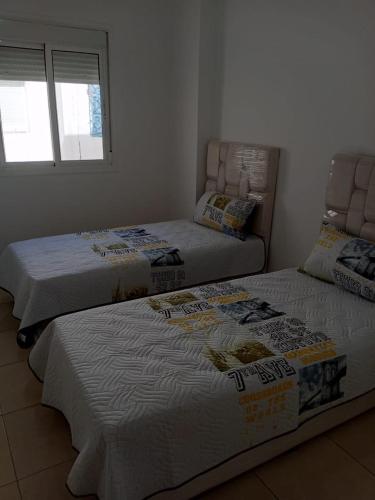Postel nebo postele na pokoji v ubytování Appartement Yasmine