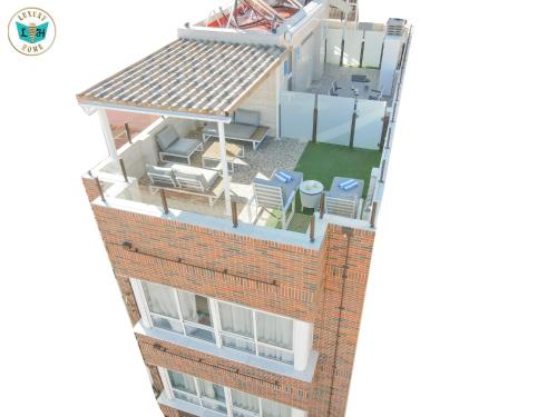 an overhead view of a building with a roof at Luxury Home Poseidon in Málaga