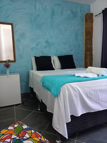 Villa dos Pássaros Paraty Hospedagemにあるベッド