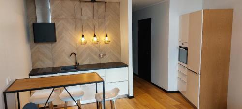 Una cocina o kitchenette en Graf Zeppelin Apartment