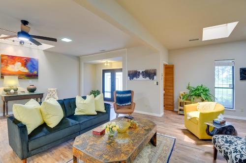 a living room with a couch and a table at Serene Buffalo Gap Oasis on 4 Secluded Acres! in Abilene