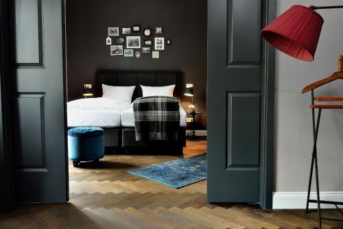 Postel nebo postele na pokoji v ubytování Syte Boutique Hotel Mannheim