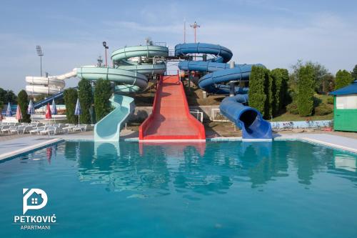 a water slide in a pool at a water park at Petković apartmani 35 in Jagodina