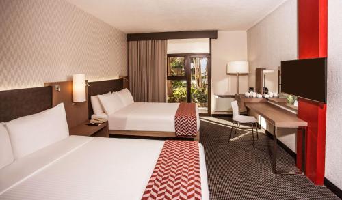Katil atau katil-katil dalam bilik di Garden Court Polokwane
