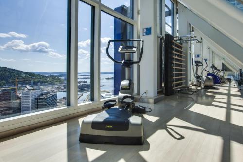 an empty gym with a view of the ocean at Radisson Blu Plaza Hotel, Oslo in Oslo