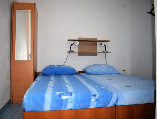 Postel nebo postele na pokoji v ubytování Studio Kabli 10225a