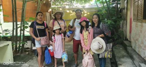 a group of people posing for a picture at Bambooze Hauz in Boracay