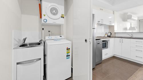Kuchyň nebo kuchyňský kout v ubytování Dolphin Quay Apartments