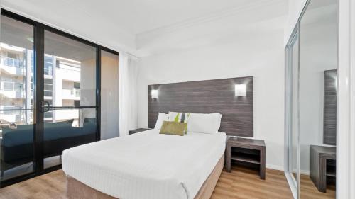 Postel nebo postele na pokoji v ubytování Dolphin Quay Apartments