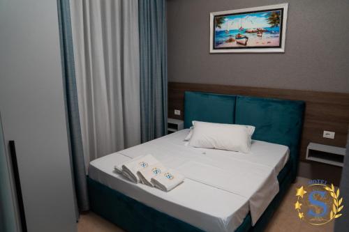 Postel nebo postele na pokoji v ubytování Sofia Hotel