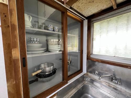 Dapur atau dapur kecil di ホテル江ノ島アパートメント