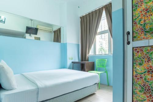 Posteľ alebo postele v izbe v ubytovaní The Quay Hotel Bukit Bintang