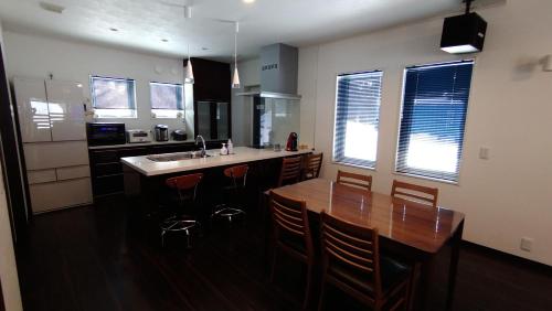 Avanti Chalet Hakuba by Jade Groupにあるキッチンまたは簡易キッチン
