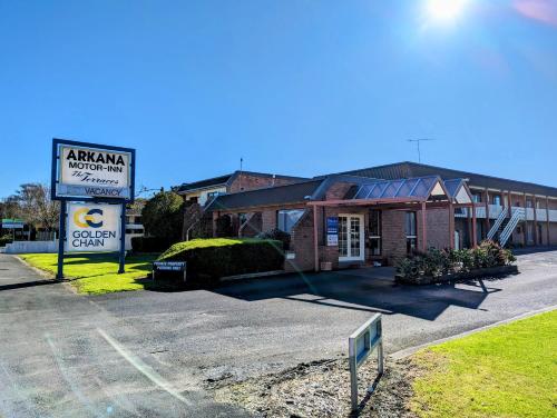 a small brick building with a sign in front of it at Arkana Motor Inn & Terrace Apartments in Mount Gambier