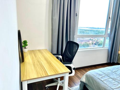 Ένα ή περισσότερα κρεβάτια σε δωμάτιο στο The D Carlton HomeStay 2BR