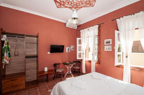 Tango Suites tesisinde bir televizyon ve/veya eğlence merkezi