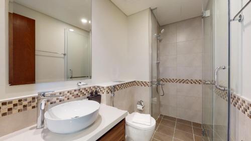 Koupelna v ubytování Primestay - Reva Residences 1BR
