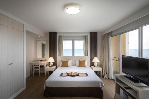 Postel nebo postele na pokoji v ubytování Kantary Bay Hotel And Serviced Apartment Rayong