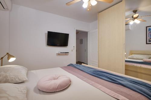 Katil atau katil-katil dalam bilik di Apartment San Pietro
