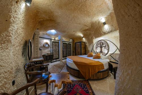 Postel nebo postele na pokoji v ubytování Ages in Cappadocia