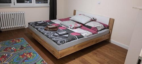a bed in a room with at 2 Rooms Apartment in old Town in Košice