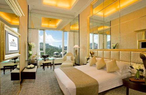 Voodi või voodid majutusasutuse Regal Hongkong Hotel toas