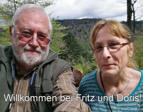 an older man and a woman posing for a picture at B3 Albmatte-FEWO Sauna, Hallenbad Außenbecken Massagen nebenan in Menzenschwand