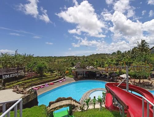 a view of a swimming pool at a resort at Umadhatu Resort by Amerta in Tabanan