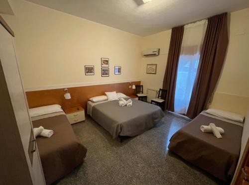 Postel nebo postele na pokoji v ubytování B&B Melibleo