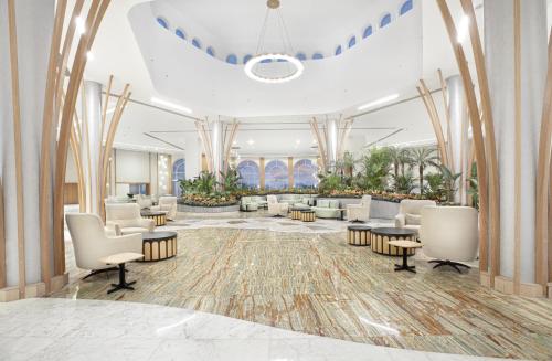 - une salle d'attente dans le hall de l'hôtel dans l'établissement Cleopatra Luxury Resort Sidi Heneish - North Coast, à Marsa Matruh